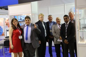 Kate , Bagrat , Dmitrii , Gunna , Vladimir , Raj and Allan in front of the OSG / Somta Stand